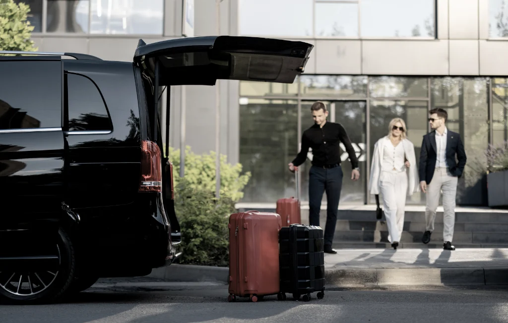 clients with luggage about to board the airport limousine