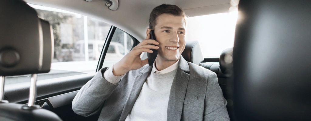 Client in the backseat during transfer service